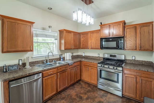 3911 Falvel Cove Dr, Spring, TX 77388 - kitchen with appliances with stainless steel finishes, a sink, brown cabinetry, and stone finish floors