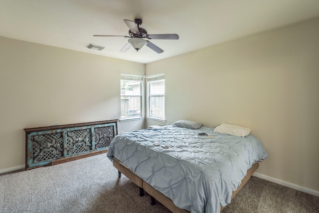 3911 Falvel Cove Dr, Spring, TX 77388 - carpeted bedroom with baseboards and a ceiling fan