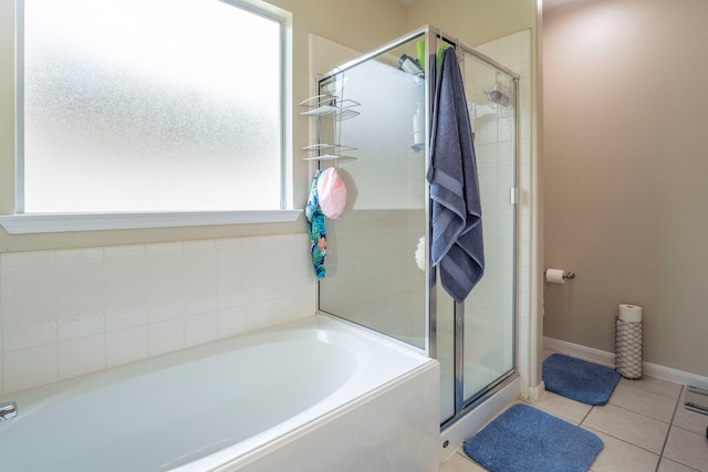 3911 Falvel Cove Dr, Spring, TX 77388 - full bathroom with healthy amount of natural light, a stall shower, and a bath