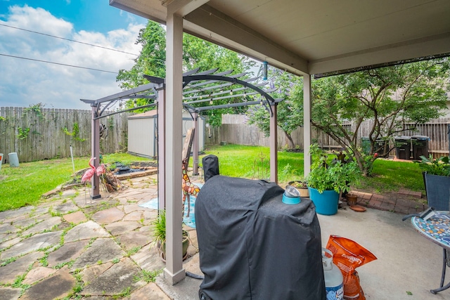3911 Falvel Cove Dr, Spring, TX 77388 - view of patio featuring grilling area, a shed, an outbuilding, and a pergola