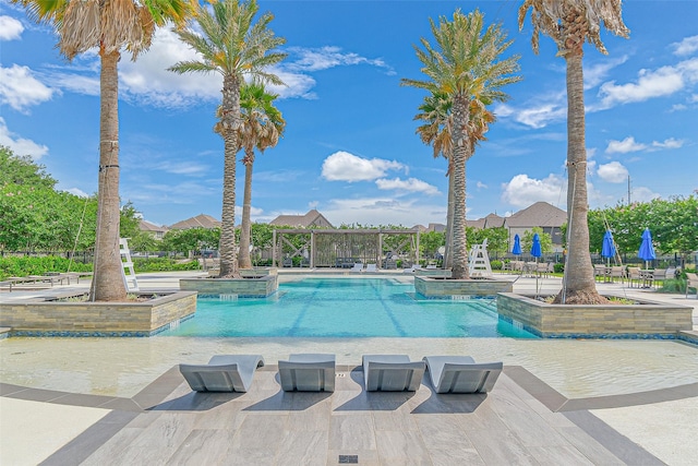 26415 Polaris Rise Ln, Richmond, TX 77406 - community pool featuring a patio