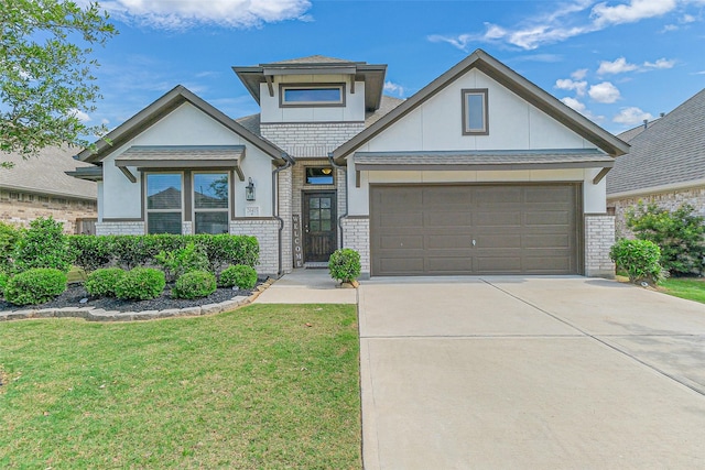 26415 Polaris Rise Ln, Richmond, TX 77406 - view of front facade with concrete driveway, a front lawn, a garage, brick siding, and stucco siding