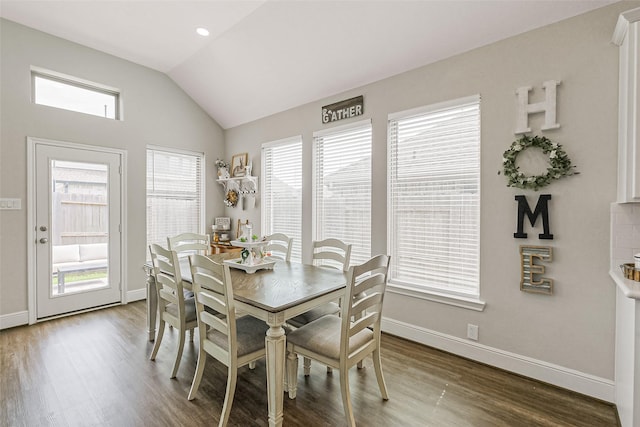 26415 Polaris Rise Ln, Richmond, TX 77406 - dining area with wood finished floors, vaulted ceiling, plenty of natural light, and baseboards