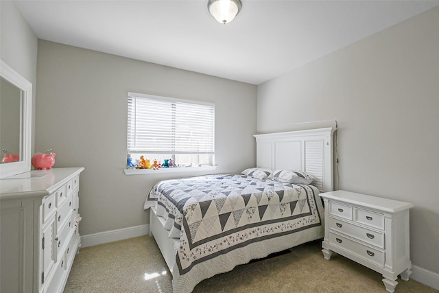 26415 Polaris Rise Ln, Richmond, TX 77406 - bedroom with baseboards and light colored carpet