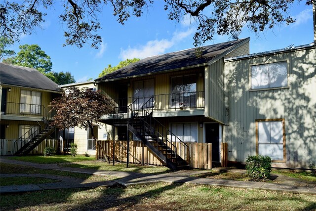 5625 Antoine Dr Unit 705, Houston, TX 77091 - rear view of property featuring stairway