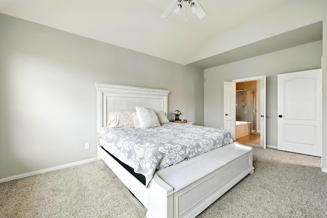 32719 Oak Heights Ln, Brookshire, TX 77423 - bedroom with light carpet, vaulted ceiling, baseboards, a ceiling fan, and ensuite bath