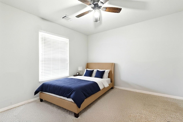32719 Oak Heights Ln, Brookshire, TX 77423 - carpeted bedroom with baseboards and a ceiling fan