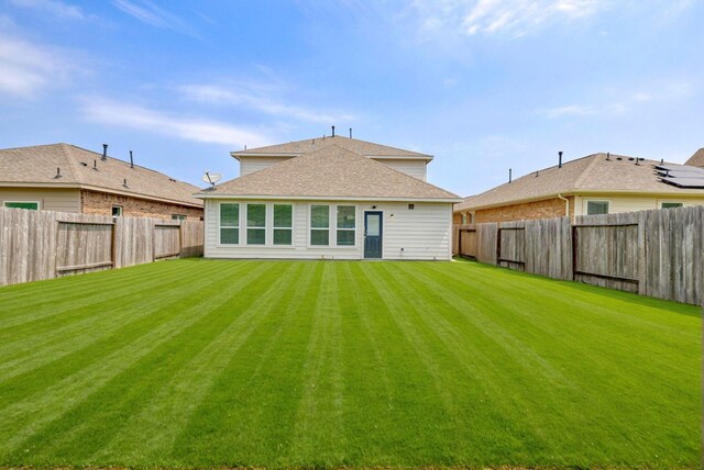 32719 Oak Heights Ln, Brookshire, TX 77423 - back of house featuring roof with shingles