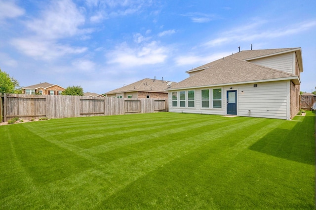 32719 Oak Heights Ln, Brookshire, TX 77423 - rear view of house featuring roof with shingles