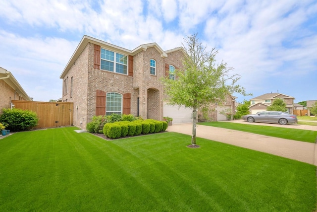 32719 Oak Heights Ln, Brookshire, TX 77423 - traditional home with brick siding, driveway, a front yard, and an attached garage