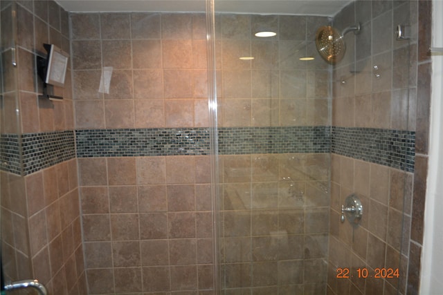 7575 Katy Fwy Unit 9, Houston, TX 77024 - bathroom with tiled shower
