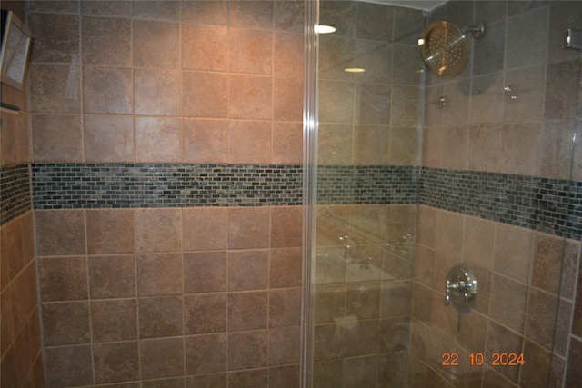 7575 Katy Fwy Unit 9, Houston, TX 77024 - bathroom with tiled shower