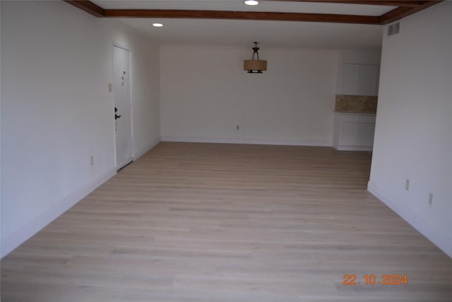 7575 Katy Fwy Unit 9, Houston, TX 77024 - empty room featuring recessed lighting, light wood finished floors, and baseboards