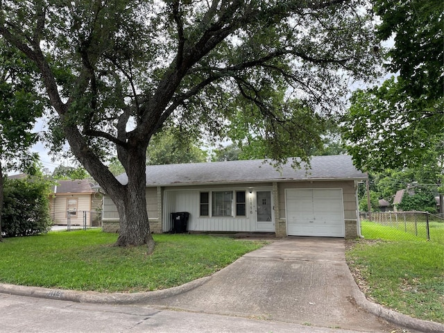 1116 Austin St, Rosenberg, TX 77471 - ranch-style home featuring a garage, brick siding, concrete driveway, and a shingled roof