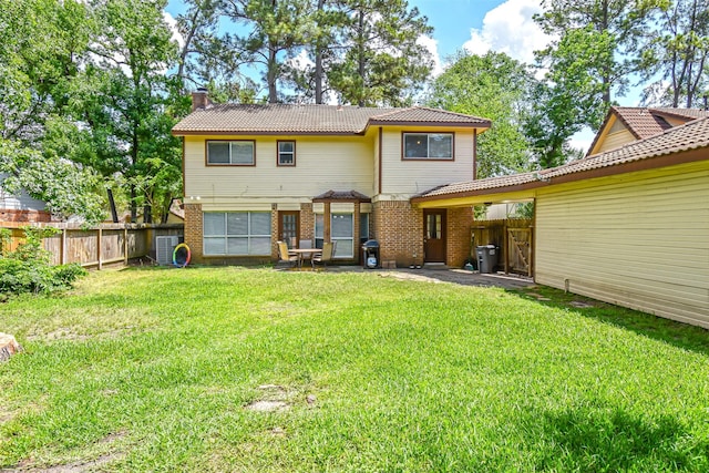 3638 Lost Oak Dr, Spring, TX 77388 - rear view of house with brick siding, a chimney, and a patio area