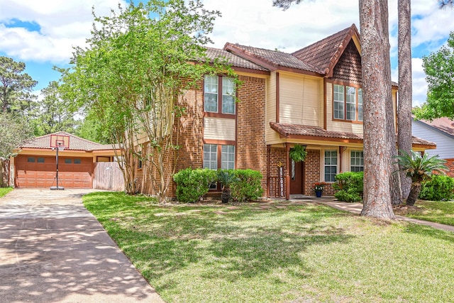 3638 Lost Oak Dr, Spring, TX 77388 - view of front of property with a front lawn, brick siding, concrete driveway, and a tiled roof