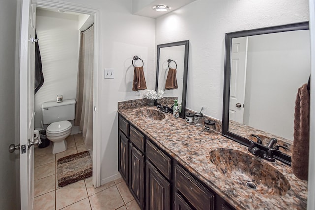 3638 Lost Oak Dr, Spring, TX 77388 - bathroom with tile patterned floors, toilet, and double vanity
