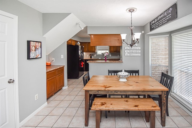 3638 Lost Oak Dr, Spring, TX 77388 - dining room featuring a chandelier and light tile patterned floors