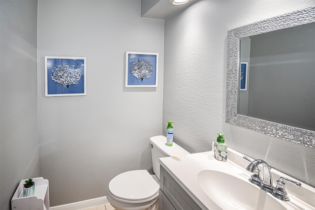 3638 Lost Oak Dr, Spring, TX 77388 - half bathroom with toilet, vanity, and a textured wall