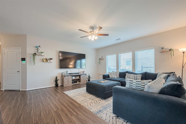 2446 Palisade Crest Dr, Rosharon, TX 77583 - living area with ceiling fan, wood finished floors, and baseboards