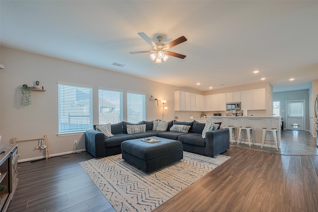 2446 Palisade Crest Dr, Rosharon, TX 77583 - living room with ceiling fan, dark wood-style flooring, baseboards, and recessed lighting