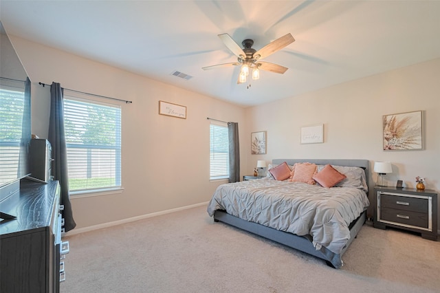 2446 Palisade Crest Dr, Rosharon, TX 77583 - bedroom with light colored carpet, baseboards, and ceiling fan