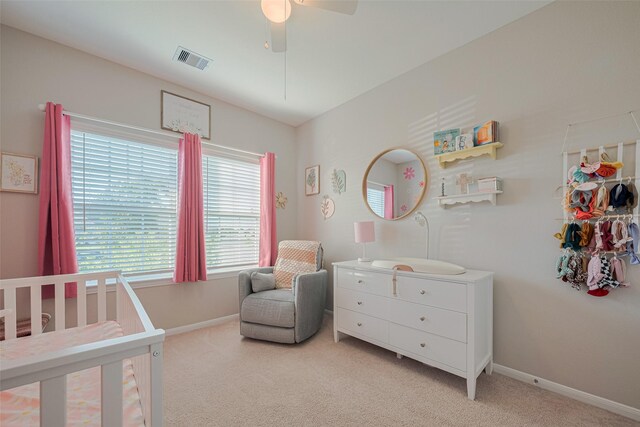 2446 Palisade Crest Dr, Rosharon, TX 77583 - bedroom featuring light colored carpet, baseboards, and ceiling fan