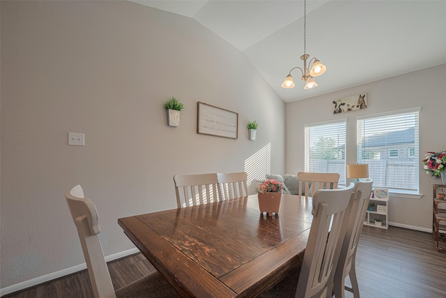 2446 Palisade Crest Dr, Rosharon, TX 77583 - dining space featuring a chandelier, vaulted ceiling, wood finished floors, and baseboards