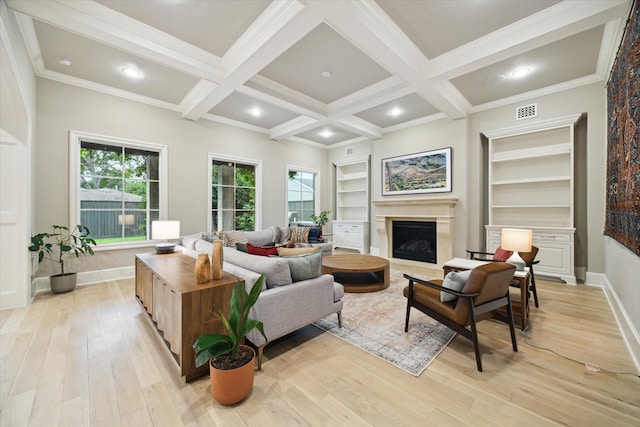 4654 Ingersoll St, Houston, TX 77027 - living area featuring a fireplace, light wood-style flooring, healthy amount of natural light, beam ceiling, and coffered ceiling