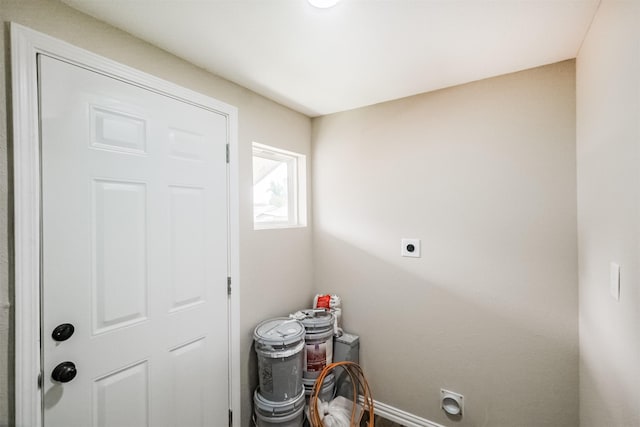 3108 Memel St, Houston, TX 77026 - washroom featuring hookup for an electric dryer and baseboards