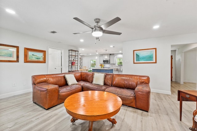 715 Timber Cove Dr, Seabrook, TX 77586 - living area featuring light wood finished floors, a ceiling fan, and recessed lighting