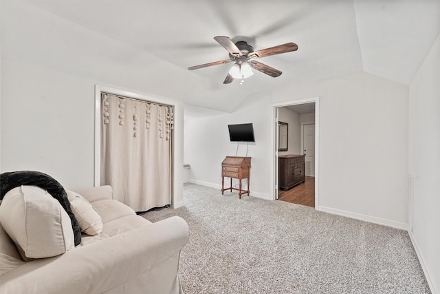 715 Timber Cove Dr, Seabrook, TX 77586 - carpeted living area with lofted ceiling and ceiling fan