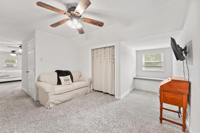 715 Timber Cove Dr, Seabrook, TX 77586 - sitting room featuring a ceiling fan, carpet floors, and vaulted ceiling