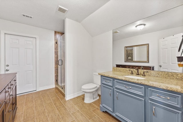 715 Timber Cove Dr, Seabrook, TX 77586 - full bathroom with vanity, a stall shower, wood tiled floors, and vaulted ceiling