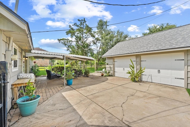 715 Timber Cove Dr, Seabrook, TX 77586 - view of patio / terrace with a garage