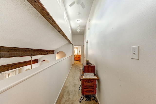 3819 Ridgeview Dr, Missouri City, TX 77459 - corridor with beamed ceiling, carpet flooring, and baseboards