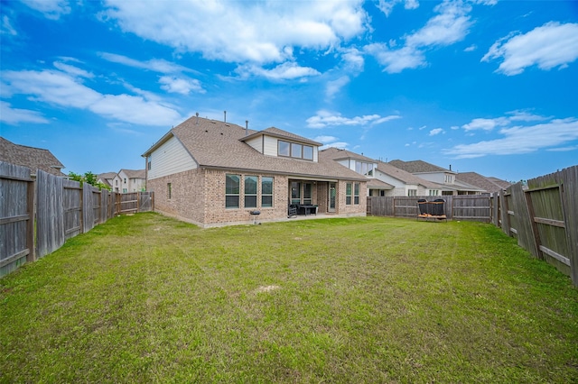 23604 Olive Creek Ln, New Caney, TX 77357 - back of house featuring brick siding