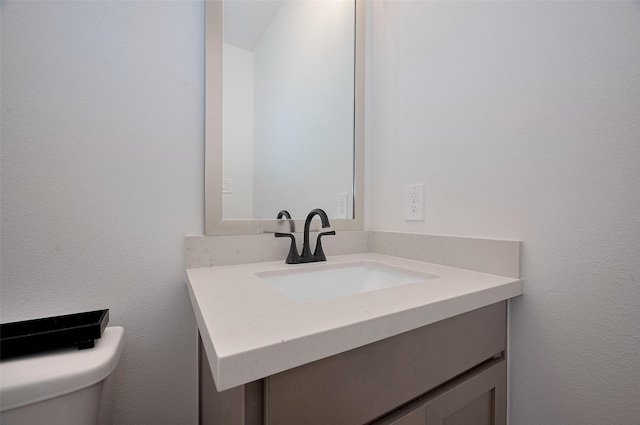 23604 Olive Creek Ln, New Caney, TX 77357 - bathroom featuring vanity and toilet