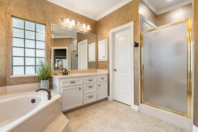 60 Fairfield Dr, Montgomery, TX 77356 - full bath with ornamental molding, a stall shower, a garden tub, and vanity