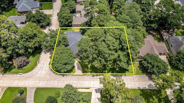 60 Fairfield Dr, Montgomery, TX 77356 - aerial perspective of suburban area with property parcel outlined