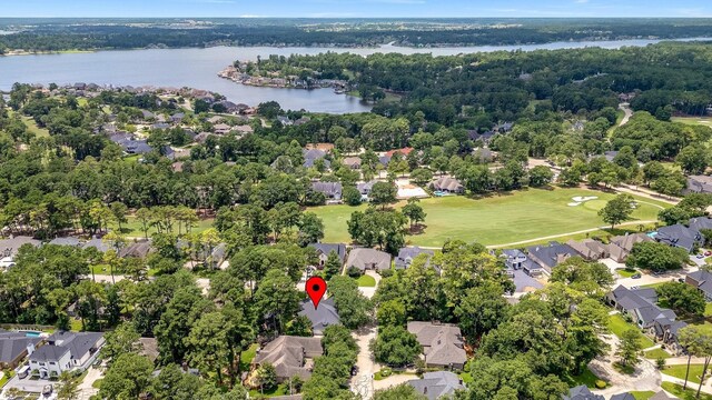 60 Fairfield Dr, Montgomery, TX 77356 - view of property location with a large body of water and nearby suburban area