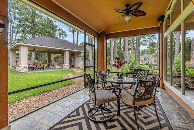 60 Fairfield Dr, Montgomery, TX 77356 - sunroom with ceiling fan and outdoor dining area
