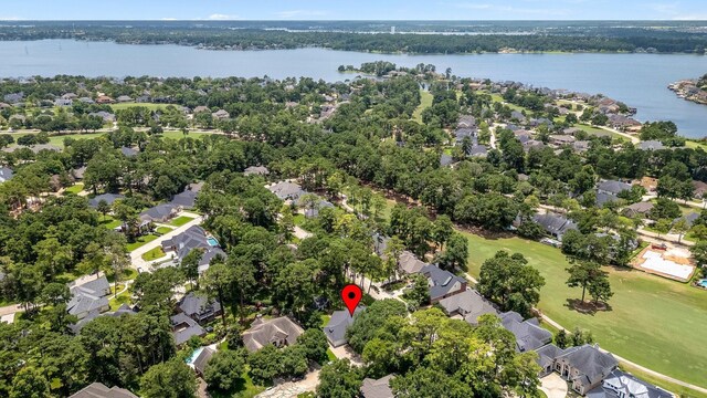 60 Fairfield Dr, Montgomery, TX 77356 - aerial view of residential area featuring a large body of water