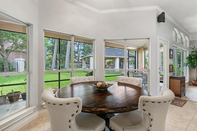 60 Fairfield Dr, Montgomery, TX 77356 - sunroom with tile patterned floors, healthy amount of natural light, and ornamental molding