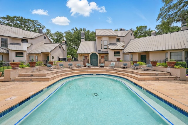 4144 Greystone Way Unit 305, Sugar Land, TX 77479 - view of swimming pool featuring a patio and fence