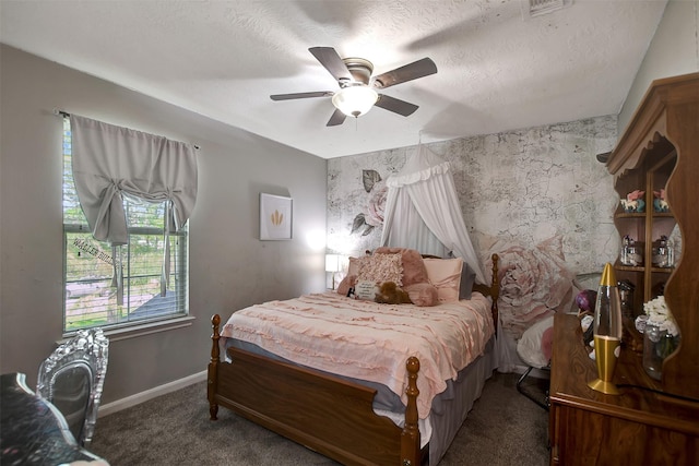 25401 Hunting Trl, Magnolia, TX 77355 - carpeted bedroom featuring baseboards, an accent wall, and a ceiling fan