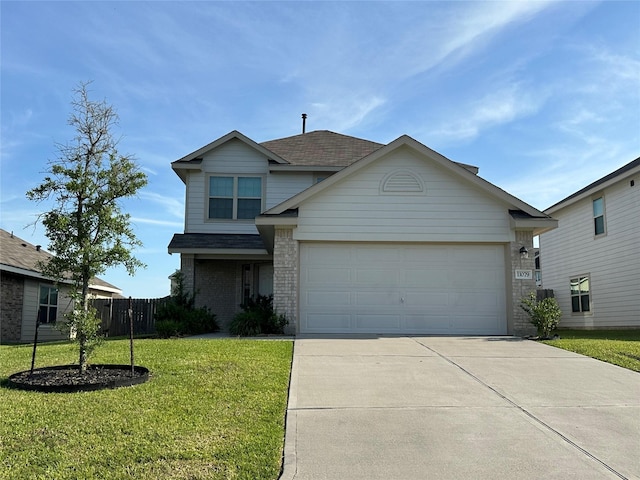 11079 N Lake Mist Ln, Willis, TX 77318 - view of front of property with brick siding, concrete driveway, a garage, and a shingled roof