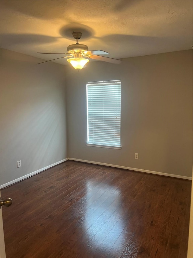 5339 Canyon Hollow Dr, Houston, TX 77084 - spare room with ceiling fan, dark wood-style flooring, and baseboards