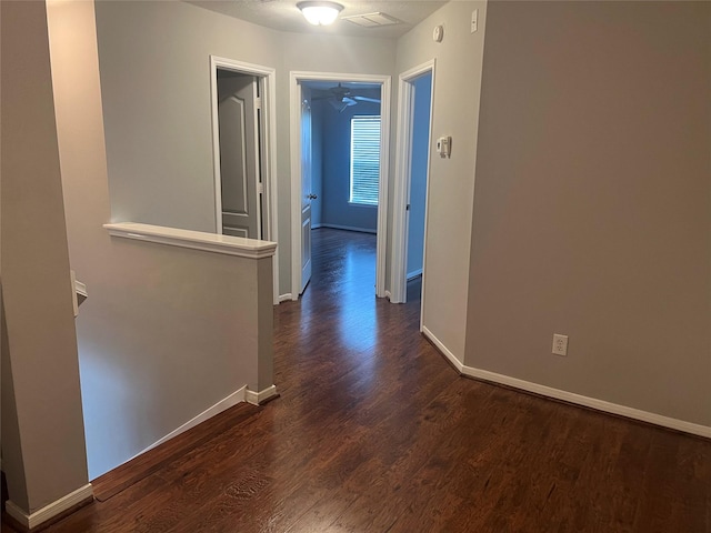5339 Canyon Hollow Dr, Houston, TX 77084 - corridor with dark wood-style flooring and baseboards