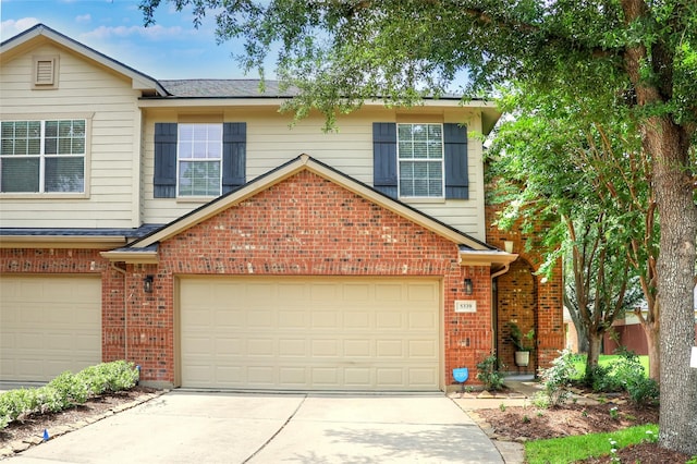 5339 Canyon Hollow Dr, Houston, TX 77084 - view of front of home featuring brick siding, concrete driveway, and a garage